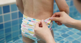 TIL swim diapers let the pee go in the pool, they are actually designed to